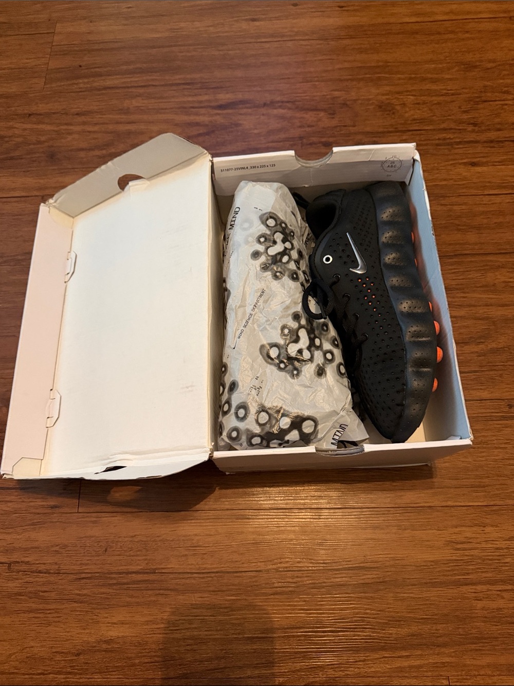 Nike Kids Black Sneakers with Orange Accents